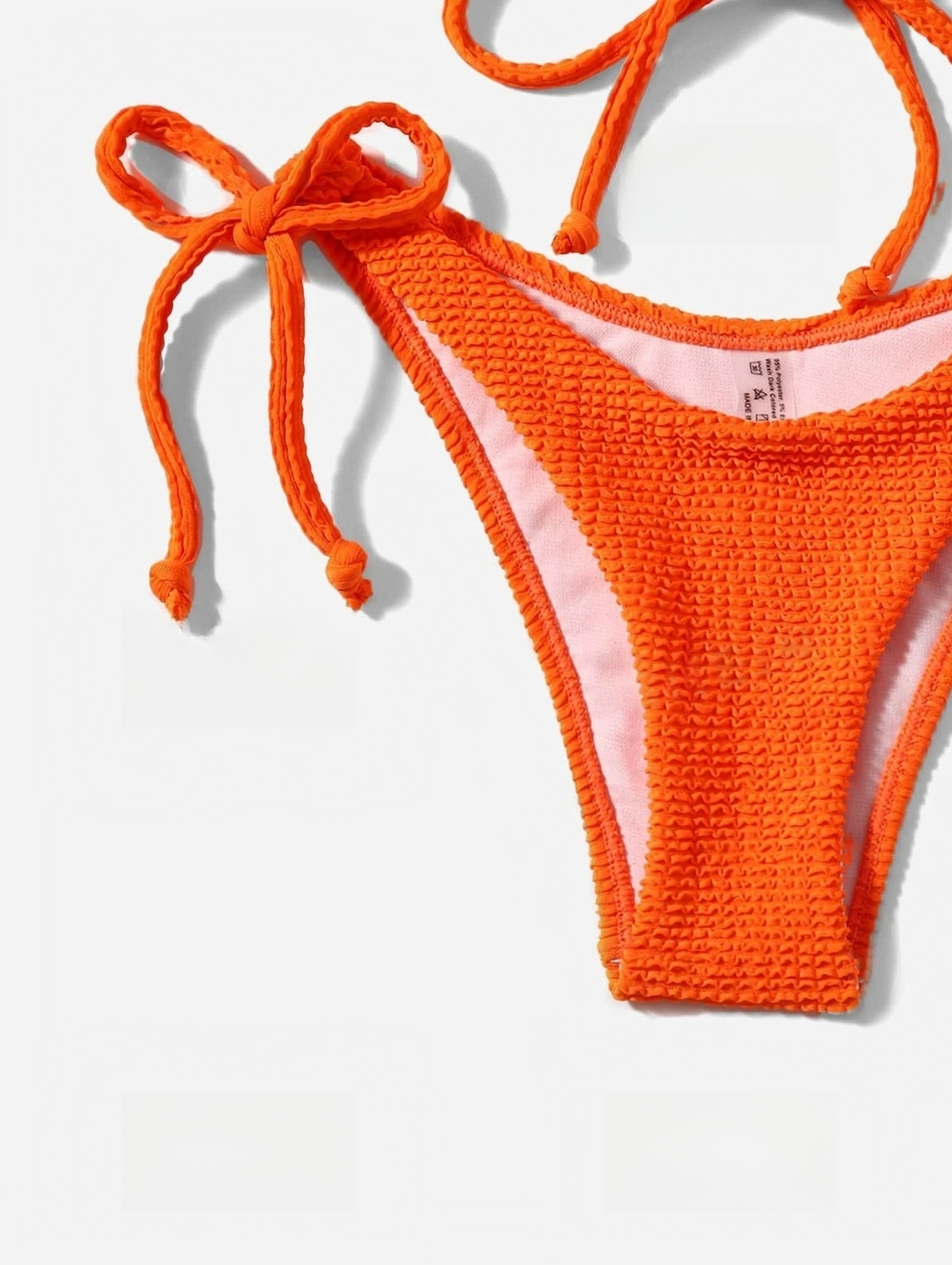 Palm Paradise: Bikini 2 piezas texturizado con top halter y pitas laterales