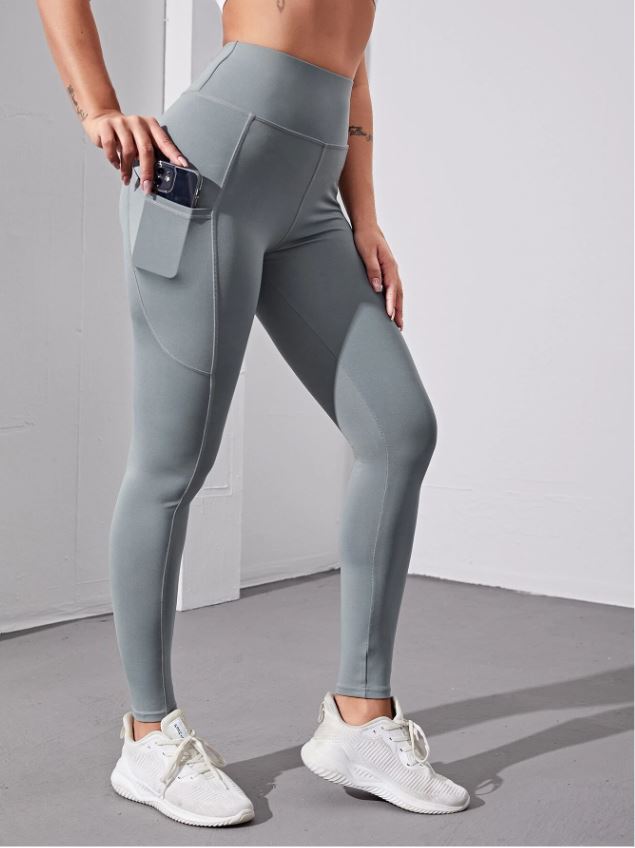Leggings deportivos de cintura alta con bolsillo para móvil