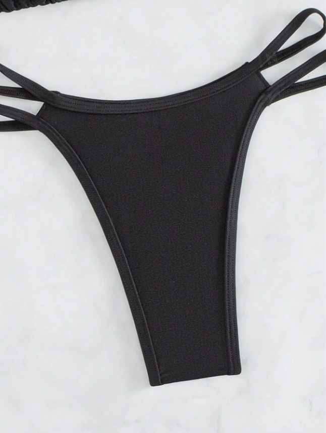 Midnight Groove: Bikini 2 piezas con cordones en la espalda y bottom de tanga color negro